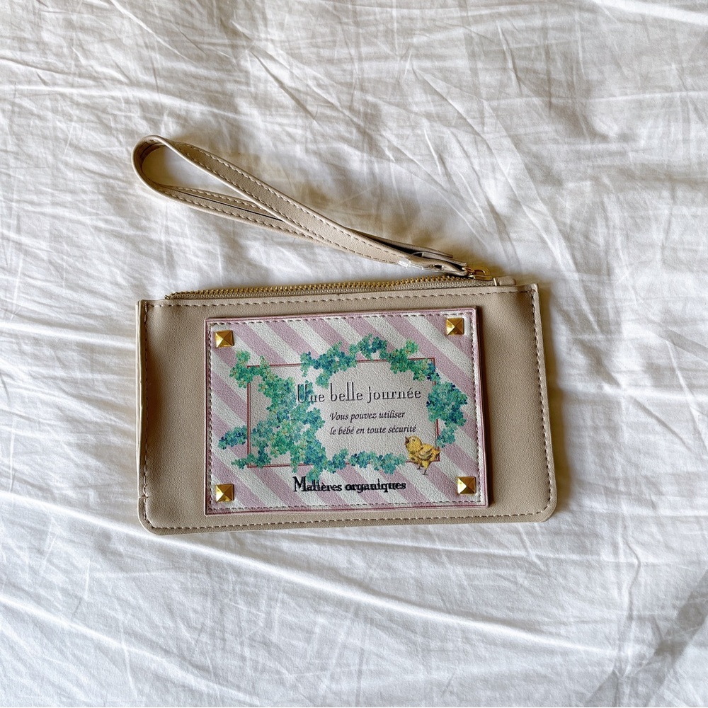 faux leather tan clutch purse with French letters